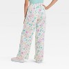 Girls' Minnie Mouse Ditsy Floral Dreamy Fleece Sweatpants - Ivory - 2 of 3