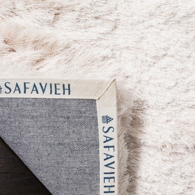 Ivory Tufted Shag 5' x 7' Wool and Synthetic Rug