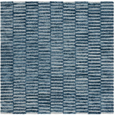 Ebony EBN751 Handmade Tufted Rug - Safavieh