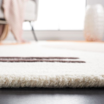 Ivory and Rust Hand-Tufted Wool 4' x 6' Area Rug
