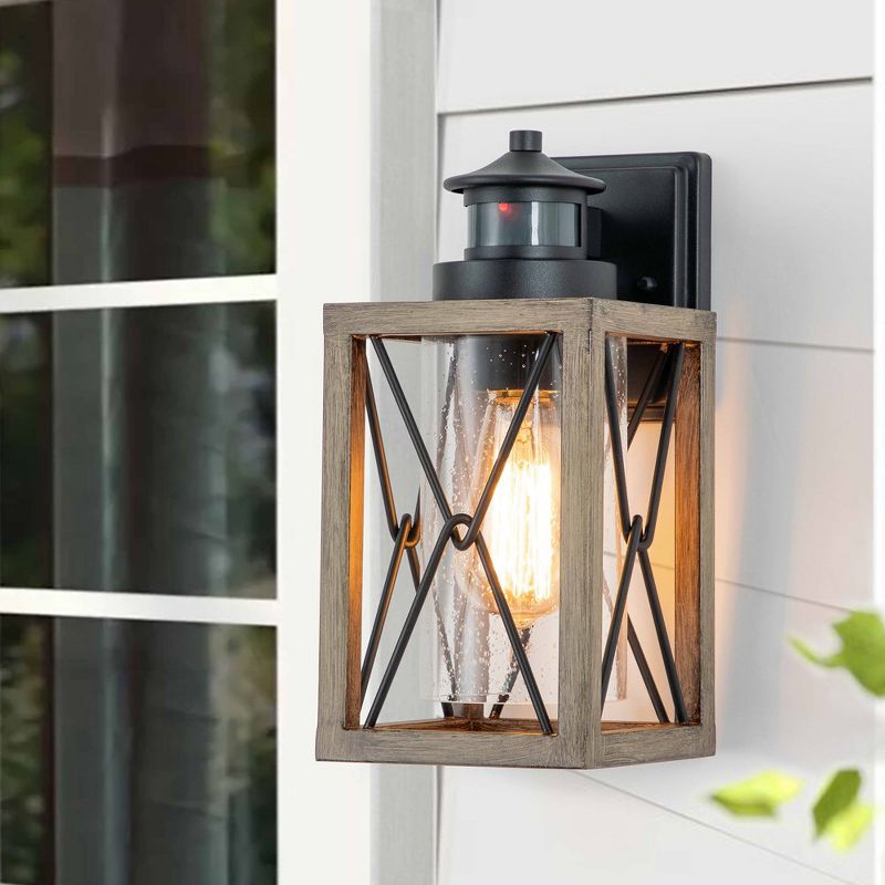 C Cattleya 1-Light Black and Faux Wood Motion Sensing Dusk to Dawn Outdoor Wall Light with Clear Seeded Glass, 2 of 8