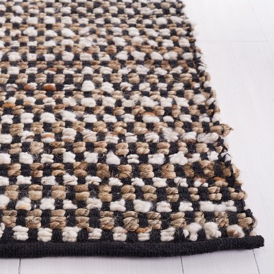 Handmade Black and Ivory Wool Flat Woven Area Rug