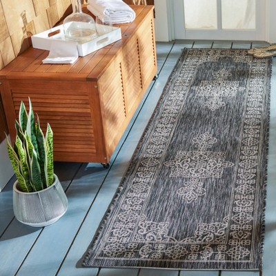 Black and Ivory Synthetic Indoor/Outdoor Runner Rug