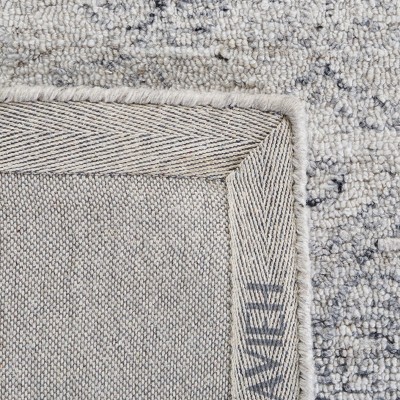 Handmade Black and Ivory Abstract Wool 8' x 10' Area Rug