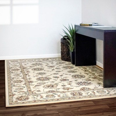 Ivory Elegance 6'7" x 9'6" Hand-Knotted Style Synthetic Area Rug