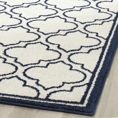 Ivory & Navy 8' x 10' Hand-Knotted Synthetic Easy Care Area Rug