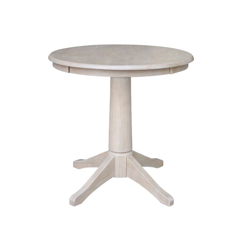 Solid Wood Round Pedestal Dining Table Weathered Gray Taupe - International Concepts, 1 of 6