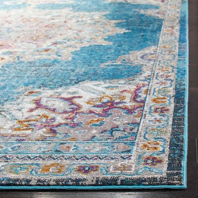 Navy and Ivory 4' x 6' Synthetic Oriental Area Rug