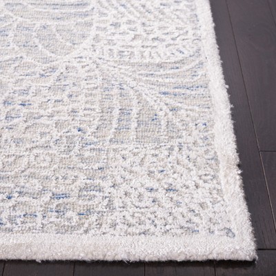 Ivory and Blue Wool 4' x 6' Handmade Geometric Rug