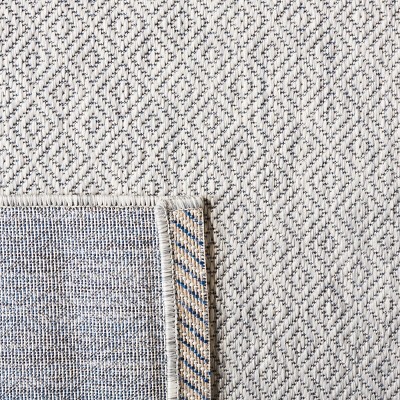 Delano Monochrome Gray Synthetic 6'7" x 9'6" Indoor/Outdoor Rug