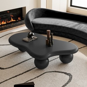 VYNXARIA 47-Inch Black Cloud Shaped Coffee Table with 3 Ball Legs - Stylish Living Room Essential - 1 of 4