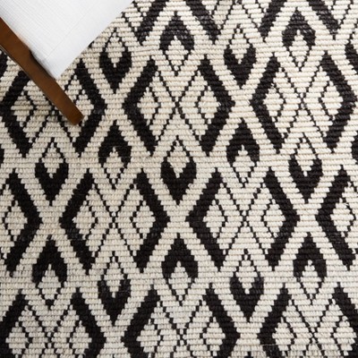 Hand-Knotted Black and Ivory Wool Area Rug, 5' x 8'