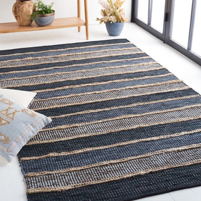Handmade Black and Natural Cowhide 8' x 10' Area Rug