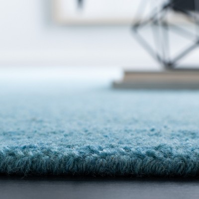 Turquoise Handmade Wool 9' x 12' Tufted Area Rug