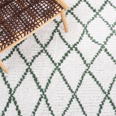 Ivory and Green Synthetic Flat Woven 5' x 7' Rug