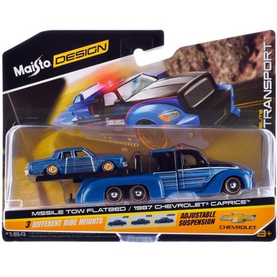 Missile Tow Flatbed Truck Blue Met and Black w/Graphics & 1987 Chevrolet Caprice Lowrider Blue Met 1/64 Diecast Models by Maisto