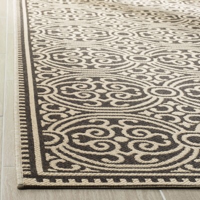Cream and Brown Geometric Flat Woven 4' x 6' Area Rug