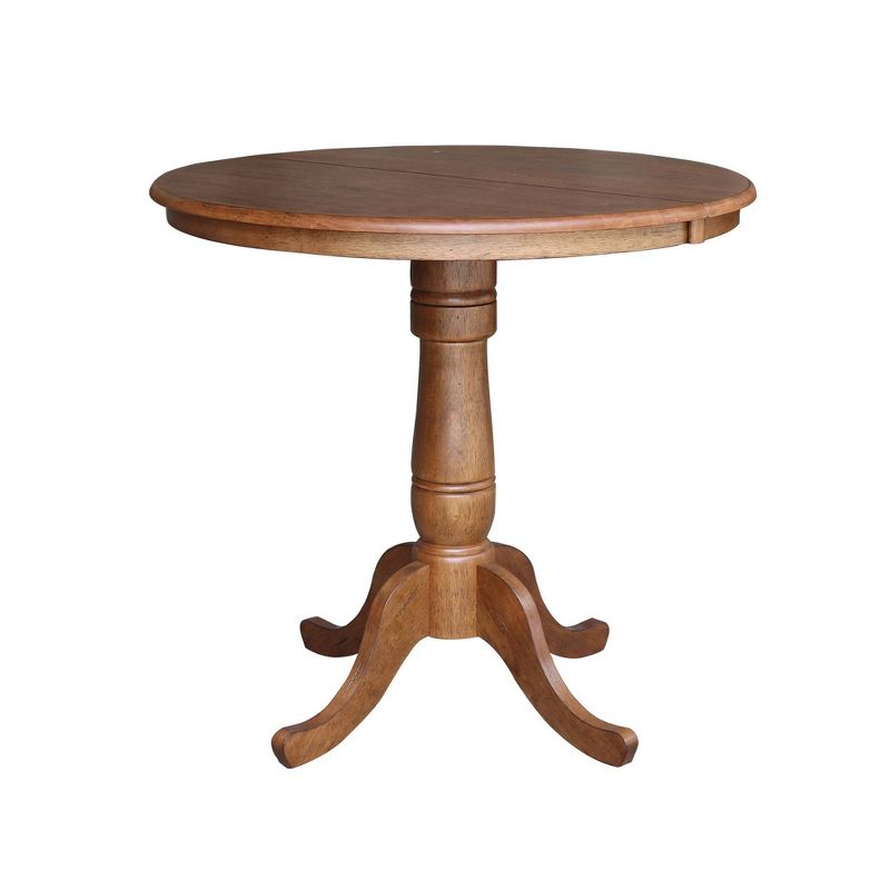 Keanan Round Top Pedestal Table with 12" Drop Leaf Distressed Oak - International Concepts, 1 of 8