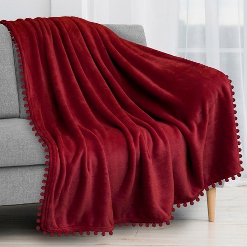 PAVILIA Fleece Pom Pom Blanket Throw for Sofa Bed Soft Lightweight Pompom Fringe Blanket for Couch Dark Red Throw 50x60