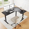 HUANUO 63" Dual Motor L-Shaped Standing Desk, Electric Height Adjustable, Built-in Power Outlets, Sit-Stand Desk, Black - 2 of 4