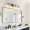 LNC Jacqueling Polished Gold and Matte Black Bathroom Vanity Light with Clear Glass, Modern, 3-Light, 4-Light - 2 of 4