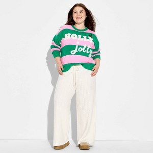 Women's Holly Jolly Festive Graphic Sweater - Multicolor Striped - 1 of 3
