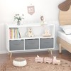 White/gray kids' bookcase with 3 collapsible fabric bins - compact toy & book storage that folds flat for space-saving nursery organization. - 3 of 4