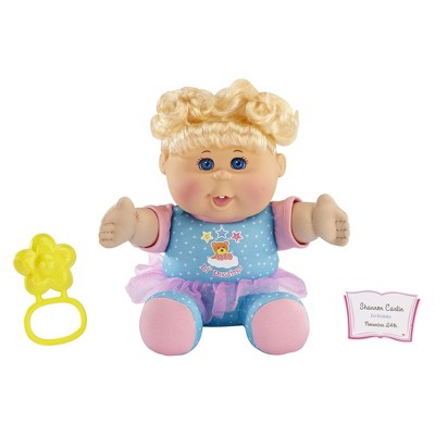 cabbage patch kids toddler girl with blonde hair and blue pajamas