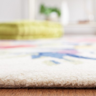 Ivory and Rose Floral Hand Tufted Wool Area Rug 4' x 6'
