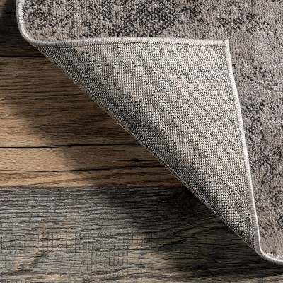 4' x 6' Red and Beige Abstract Synthetic Area Rug