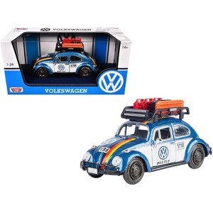 1966 Volkswagen Beetle Off Road #1718 Blue Met and White w/German Flag Stripes and  Accessories 1/24 Diecast Model by Motormax - 1 of 3