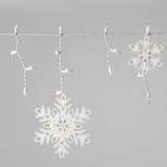 150ct Incandescent Icicle Lights with Snowflake Novelty Accent Clear Bulbs with White Wire - Wondershop™