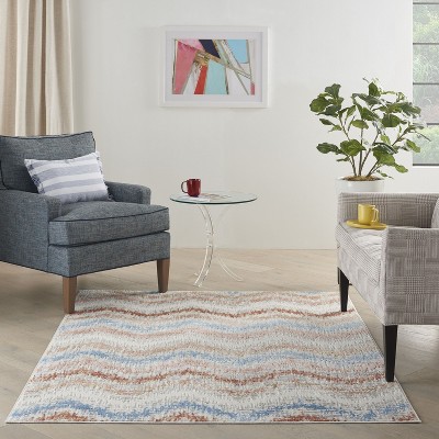 Ivory Multicolor 4' x 6' Abstract Synthetic Area Rug