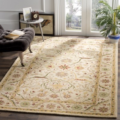 Ivory Hand Tufted Wool Rectangular Area Rug