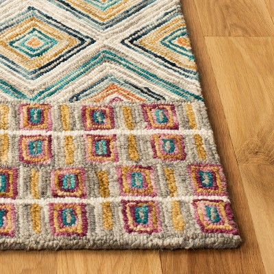 Handmade Geometric Tufted Wool Area Rug in Green/Red - 4' x 6'