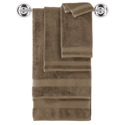 brown and white bath towels
