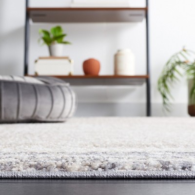Ivory and Gray Synthetic Rectangular Area Rug, 5'3" x 7'6"