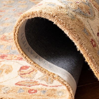 Ivory and Blue Hand Tufted Wool 4' x 6' Area Rug