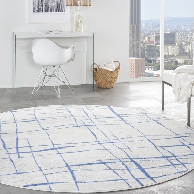 Whimsicle Blue and Ivory Abstract Round 8' Area Rug