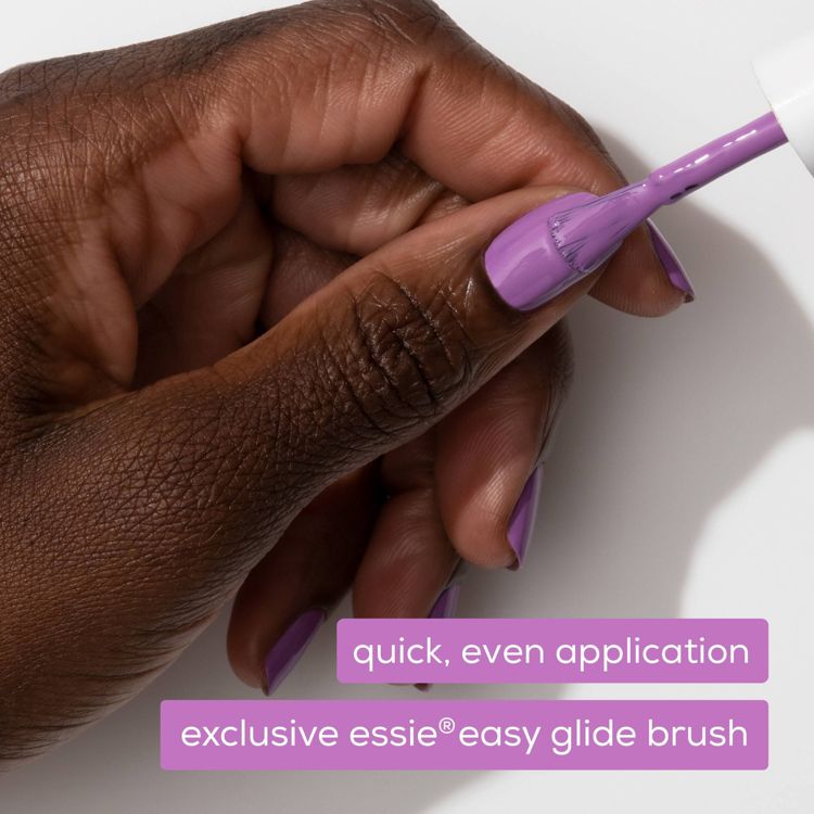 A hand applying purple colored nail polish with a brush, accompanied by text stating "quick, even application" and "exclusive essie® easy glide brush."