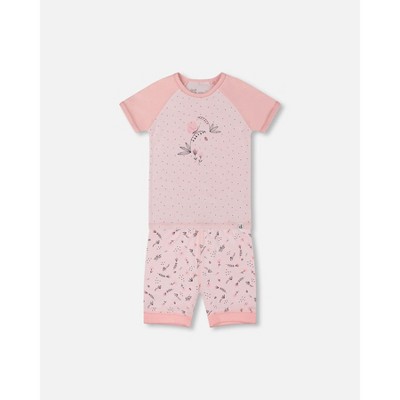 small pink flowers on pale pink