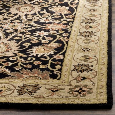 Handmade Black and Ivory Tufted Wool Area Rug