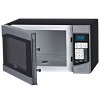 Oster 0.9 Cubic Feet 900-Watt Countertop Microwave Oven in Black and Silver - 2 of 4