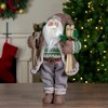 Northlight 18" Standing Santa Christmas Figure Carrying Presents and Skis - 2 of 4