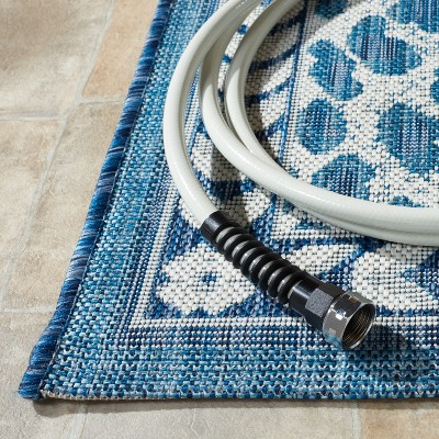 Courtyard Blue and Ivory Washable Synthetic Outdoor Rug