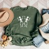 Simply Sage Market Women's Graphic Sweatshirt Two Dancing Skeletons - 2 of 2
