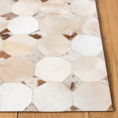 Ivory and Brown Geometric Cowhide 4' x 6' Area Rug