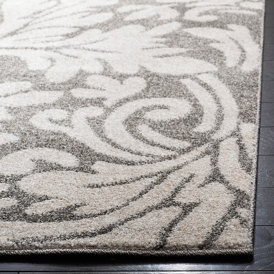 Dark Grey and Beige Floral Synthetic Area Rug