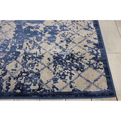 Ivory and Navy Blue Medallion 2'2" x 7'6" Synthetic Area Rug