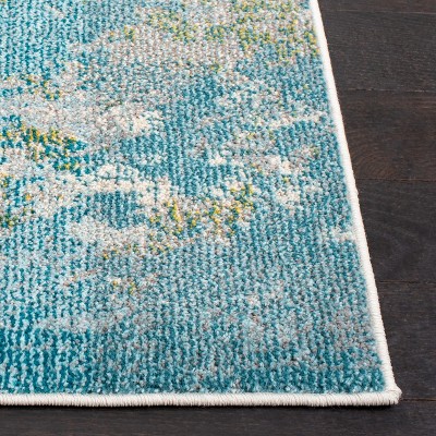 Light Blue and Green Abstract Distressed 6' x 9' Rug
